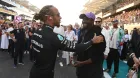 Lewis Hamilton y Will.i.am en Abu Dabi