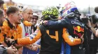 Lando Norris y Max Verstappen celebran el podio en Imola