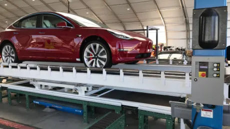 tesla-model-3-all-wheel-drive-performance-rolls-off-new-assembly-line-in-temporary-structure_100655302_m.jpg